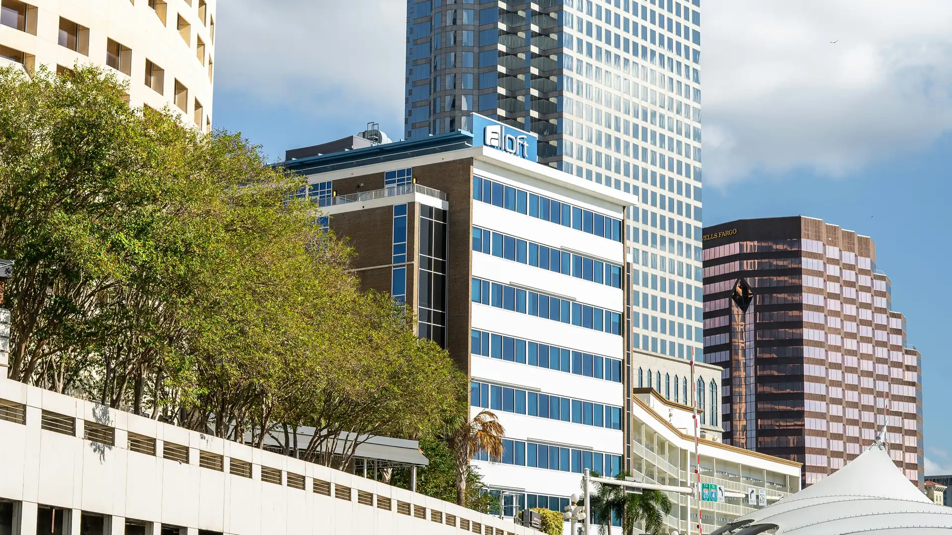 The Tampa Riverwalk winding beneath the downtown skyline
